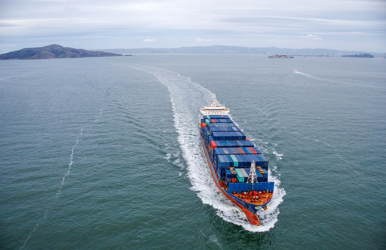Aerial view of a container ship sailing at sea